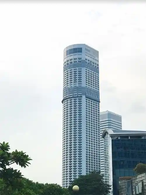 Aerial view of Raffles City complex showing its windmill-shaped design